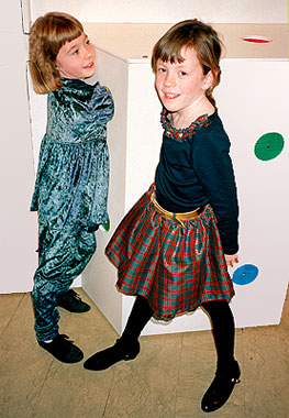 small girls feeling inside box