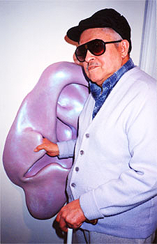 blind man touches ear