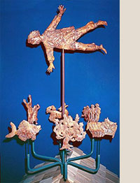 metal sculpture of dar flying