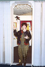 woman welcoming audience at book entrance